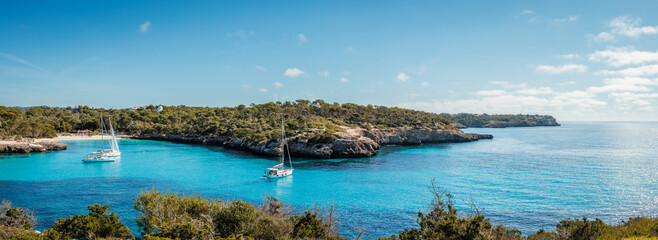 Cala Mondrago bay with beach and blue sea at Mallorca. Idyllic vacation and travel destination at...