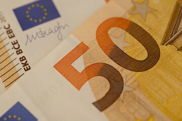 closeup 50 euro banknotes of european union, concept of savings, banking, tax payment, economic...