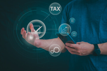 financial research government tax and calculation tax return concept Businessman showing holographic tax on hand Online tax return form filling concept for payment, online marketing, business process.