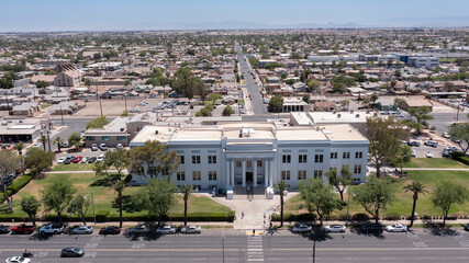 Daytime view of the historic 1924 Imperial County Courthouse, built in the Beaux-Arts style in El Centro, California, USA. - obrazy, fototapety, plakaty