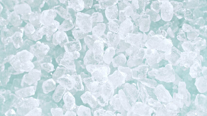 Super slow motion of rotating ice cubes, top view shot