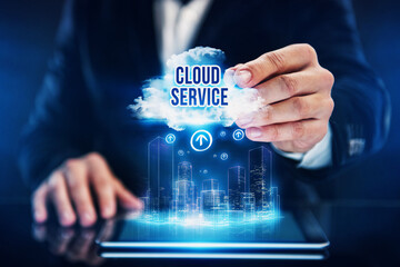 Fototapeta na wymiar Cloud services concept. Businessman use cloud technology to be more productive