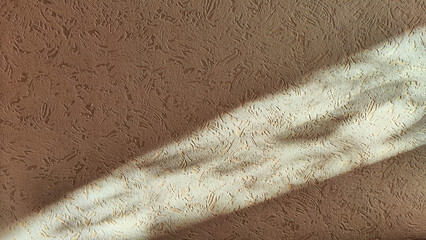 Abstract drawing from the shadow with light from the window. Texture, background and frame of light and shadow on the wall. Blurred backdrop