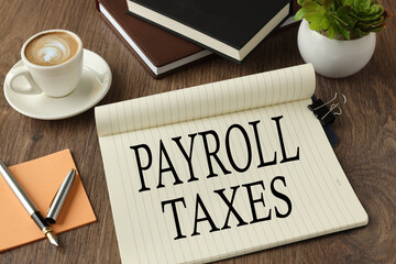 payroll taxes. view from above. Concept background with chart, paper and pen