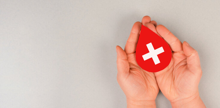 Holding drop of blood in the hands, donate plasma, world blood donor day, health care, transfusion, Leukaemia disease
