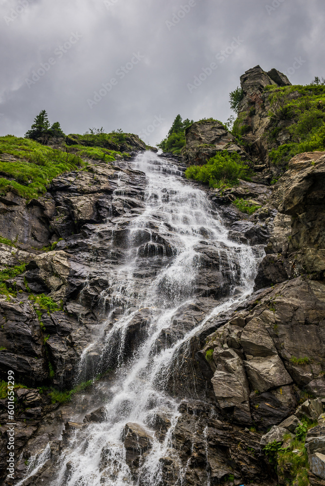 Sticker Capra Waterfall next to Transfagarasan Road in Carpathian Mountains in Romania