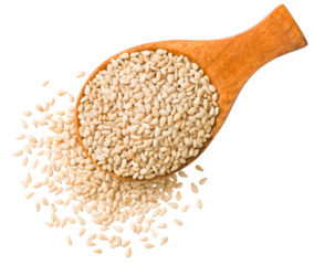 Roast white sesame seeds in the wooden spoon, isolated on white background, top view.