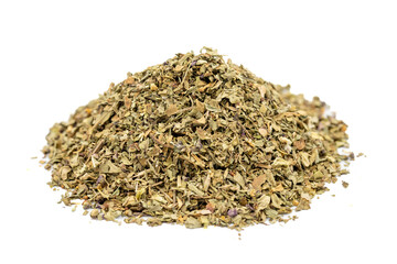 Dried crushed basil isolated on white background. Dried ground basil powderl. Spice concept