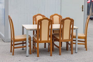 Six Wooden Chairs and Dining Table
