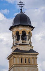 Fototapeta premium Bell tower of Coronation Cathedral of Holy Trinity in area of Alba Carolina Fortress in Alba Iulia