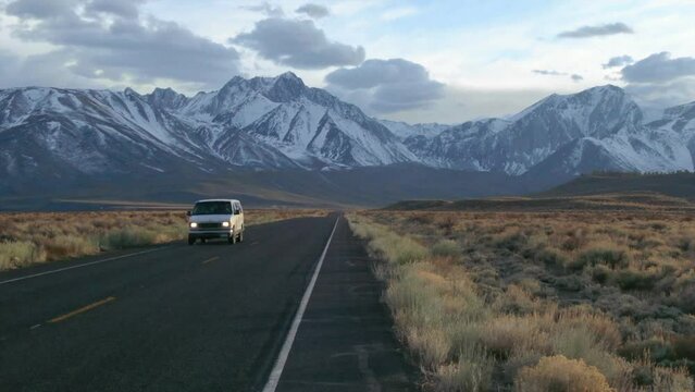 Mammoth Lakes California i395 Benton Crossing road Sierra Nevada Mountains Van driving road driving to hilltop hot spring soak late after sunset stunning to zooming in