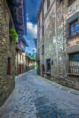 Obraz premium narrow street of old Catalan village in Pyrenees. Rupit, Spain
