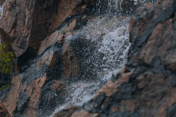 Waterfall Loud threshold on the slope of the Monastery Island in the Dnieper, Ukraine. Artificial decorative waterfall.