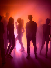 Silhouettes of people dancing under colorful lights in a nightclub. The image captures the joy of live music, the energy of the crowd, and the vibrant atmosphere of nightlife. Generative AI.