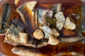 Pickled mackerel. Blue fish marinated with garlic and pickled sauce
