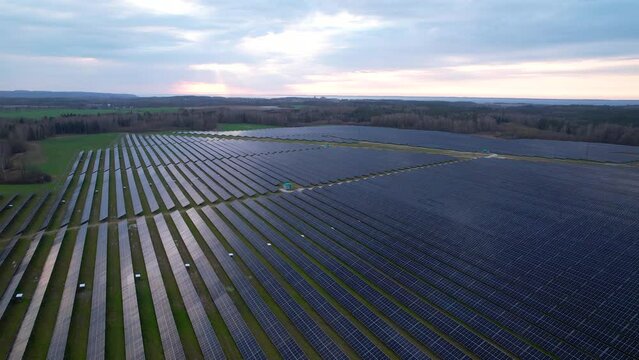 PV panels cover large area in Polish countryside, emissions free energy. Drone