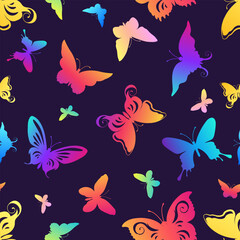Seamless pattern with rainbow butterflies on a blue background. Pattern for fabrics, wrapping paper.