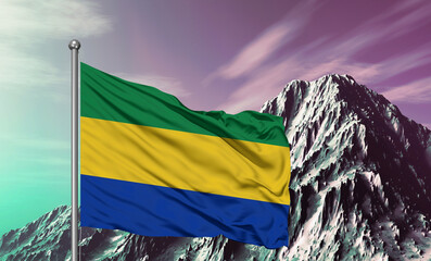Gabon national flag cloth fabric waving on beautiful sky mountain Background.