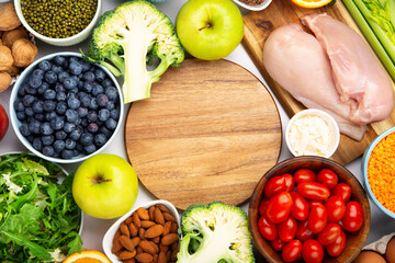 Fresh Ingredients for Dietary, Vegetables, Fruits, Nuts, Meat for Weight Loss on White Background