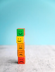 Wooden Cubes with different emotions  . Empathy Concept  
