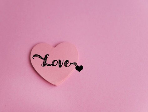 Naklejka Love message on heart pink sticky note