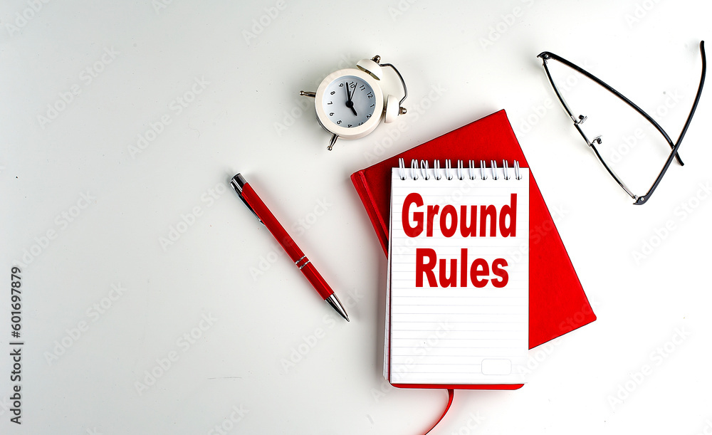 Poster ground rules text on notebook , red pen and notebook, business concept, white background