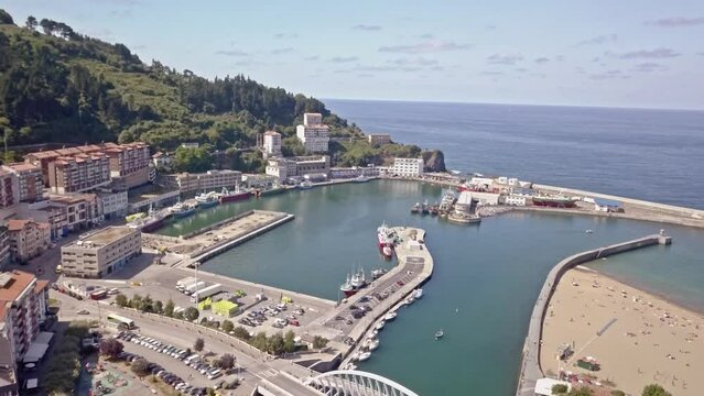 Aerial view of canal and harbor of ondarroa fishing village on sunny day