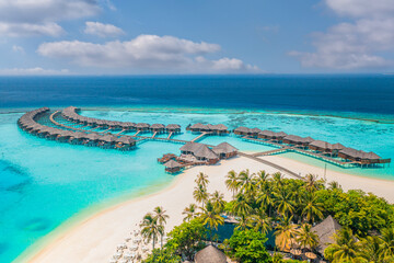 Maldives paradise island. Tropical aerial landscape, coast seascape water bungalows villas with amazing sea lagoon beach. Exotic tourism destination, summer vacation background. Aerial amazing travel