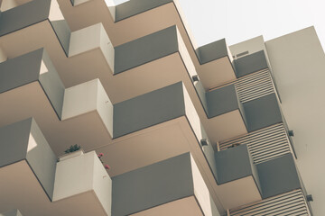 Modernist architecture in Ibiza, Spain. Concrete buildings painted in soft colors with minimal and essential lines. Typical Spanish balearic architecture.