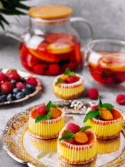 Mini cheesecake with apricot in muffin forms