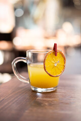 A cup of vitamin citrus tea on the table