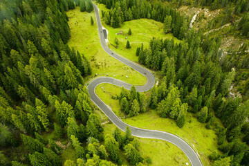 The serpentine and picturesque Snake Road driveway weaves through the majestic Alpine mountains