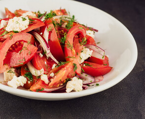 Salad with Goat Cheese, dill, Tomato and Red Onion Rings
