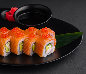 Philadelphia sushi rolls with caviar on plate