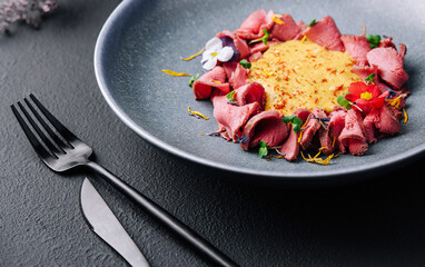 ham in cheese sauce on plate