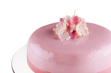 Pink mousse cakes decorated on white plate