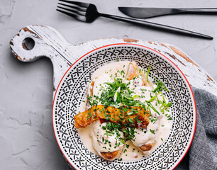 Cepelins or zeppelins with pork and pancetta cracklings © AntAlexStudio
