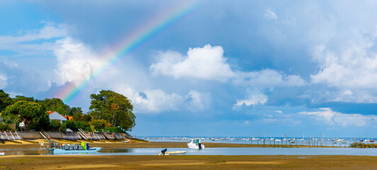 Beautiful landscape with rainbow, traditional french fishing village in atlantic ocean- Bassin d'Arcachon,  cape ferret- France