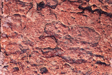 Red Rough Stone Texture Background. Rough stone wall background Texture. and Red stone texture background. Material construction and architectural detail