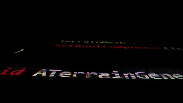 Closeup macro shot movement of coding script moving across LED screen with real-time AI-generated typing, showcasing advanced AI learning in optimization, debug and coding for software development.