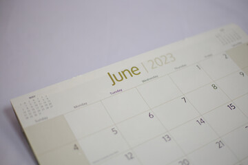 Selective focus shot of a closeup calendar of June 2023. June 2023 calendar isolated on background. 