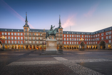 Plaza Mayor at sunrise with King Philip III (Felipe III) statue - Madrid, Spain © diegograndi