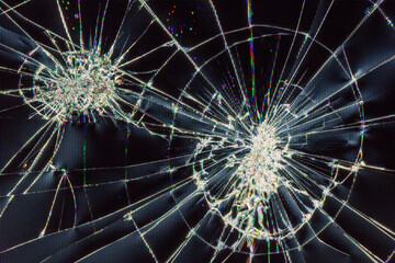 Obraz premium traces of bumps and cracks on a broken LCD screen, computer monitor or TV