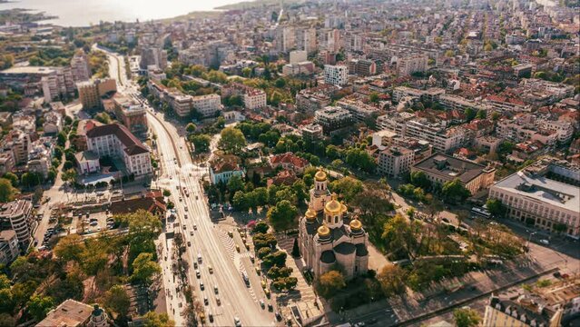Travel to Bulgaria and Black sea resorts concept. Tilt shift summer hyperlapse Varna Cathedral downtown. Aerial timelapse