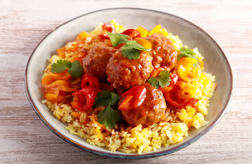 Sweet and sour meatballs with pepper and gravy