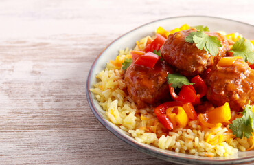 Sweet and sour meatballs with pepper and gravy