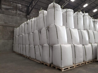 Chemical fertilizer The product stock is packed in sacks, stacked in the warehouse, waiting for delivery.