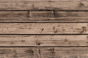 Fototapeta premium Raw wooden planks. Graphic effect pattern of a rustic desaturated timber board. Top view.