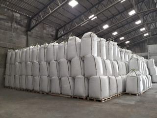 Chemical fertilizer The product stock is packed in sacks, stacked in the warehouse, waiting for delivery.