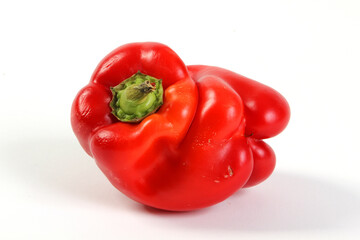 Red bell pepper with lips on white BG